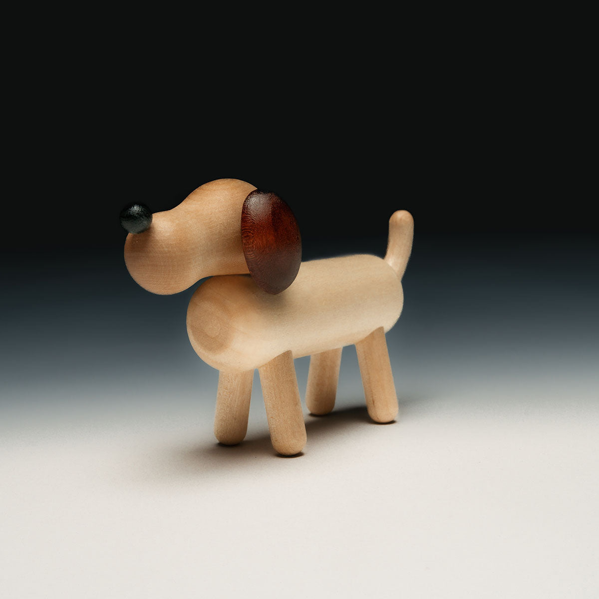 Dog sculpture, varnished wood and brown