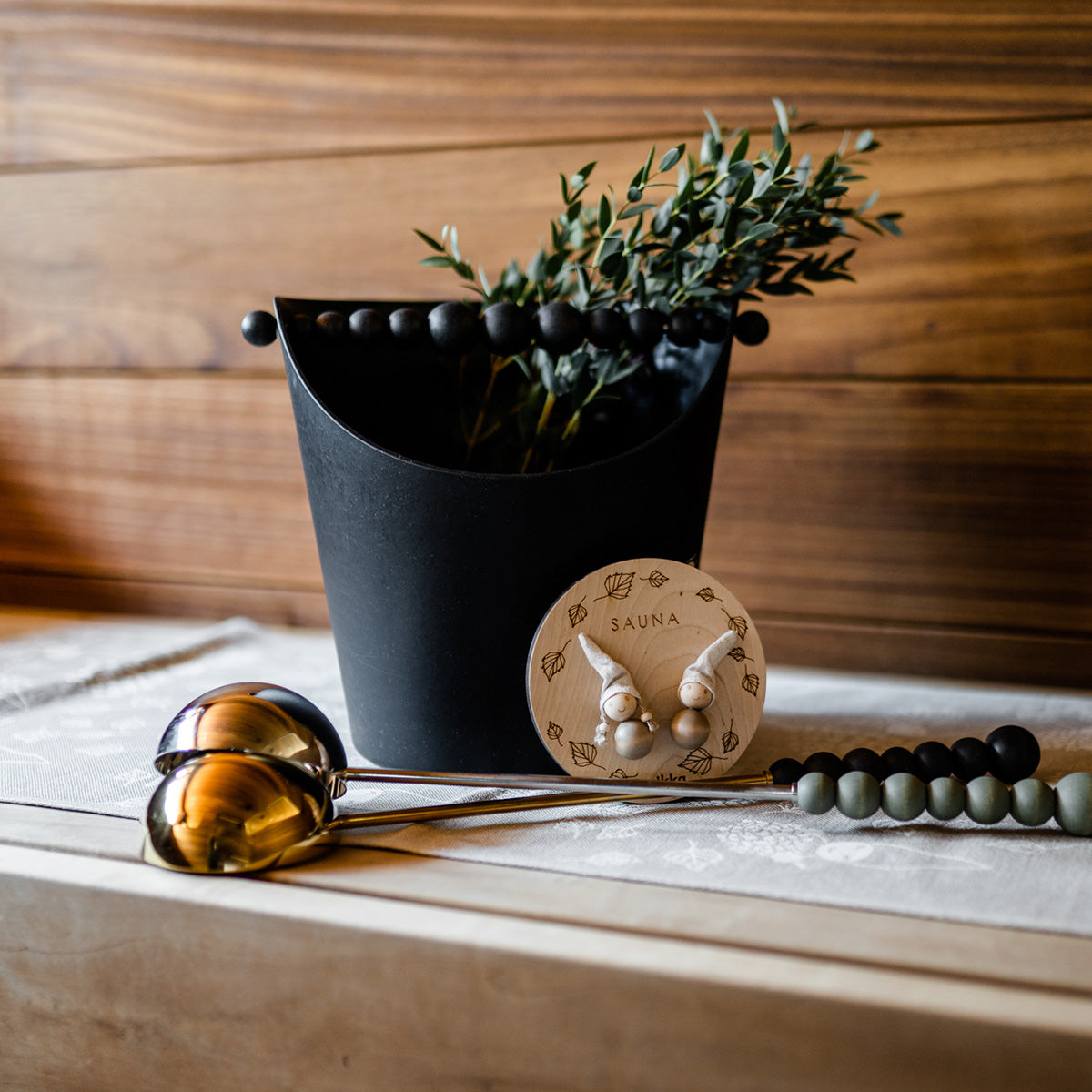 Nuppu sauna ladle, gold and black