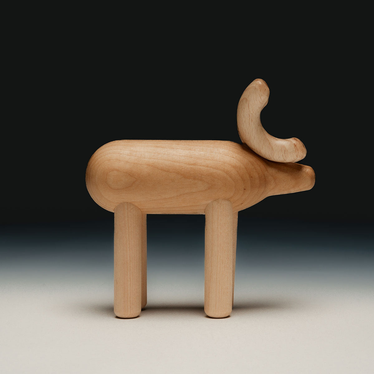 Reindeer sculpture, varnished wood