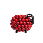 Pohjanpässi figurine, shades of red
