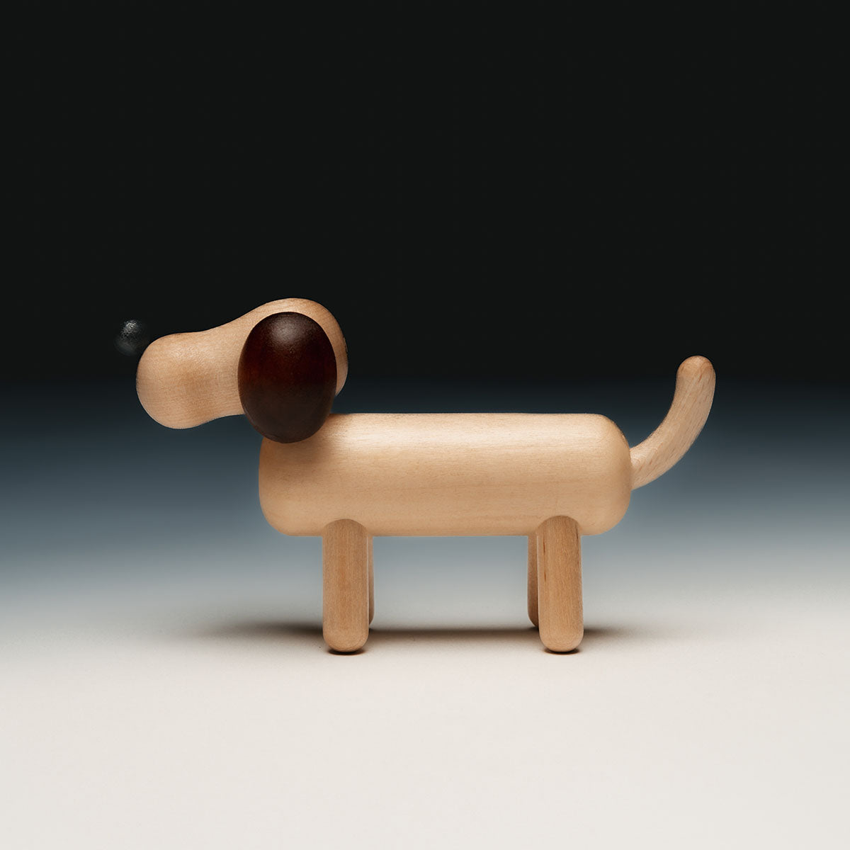 Dog sculpture, varnished wood and brown