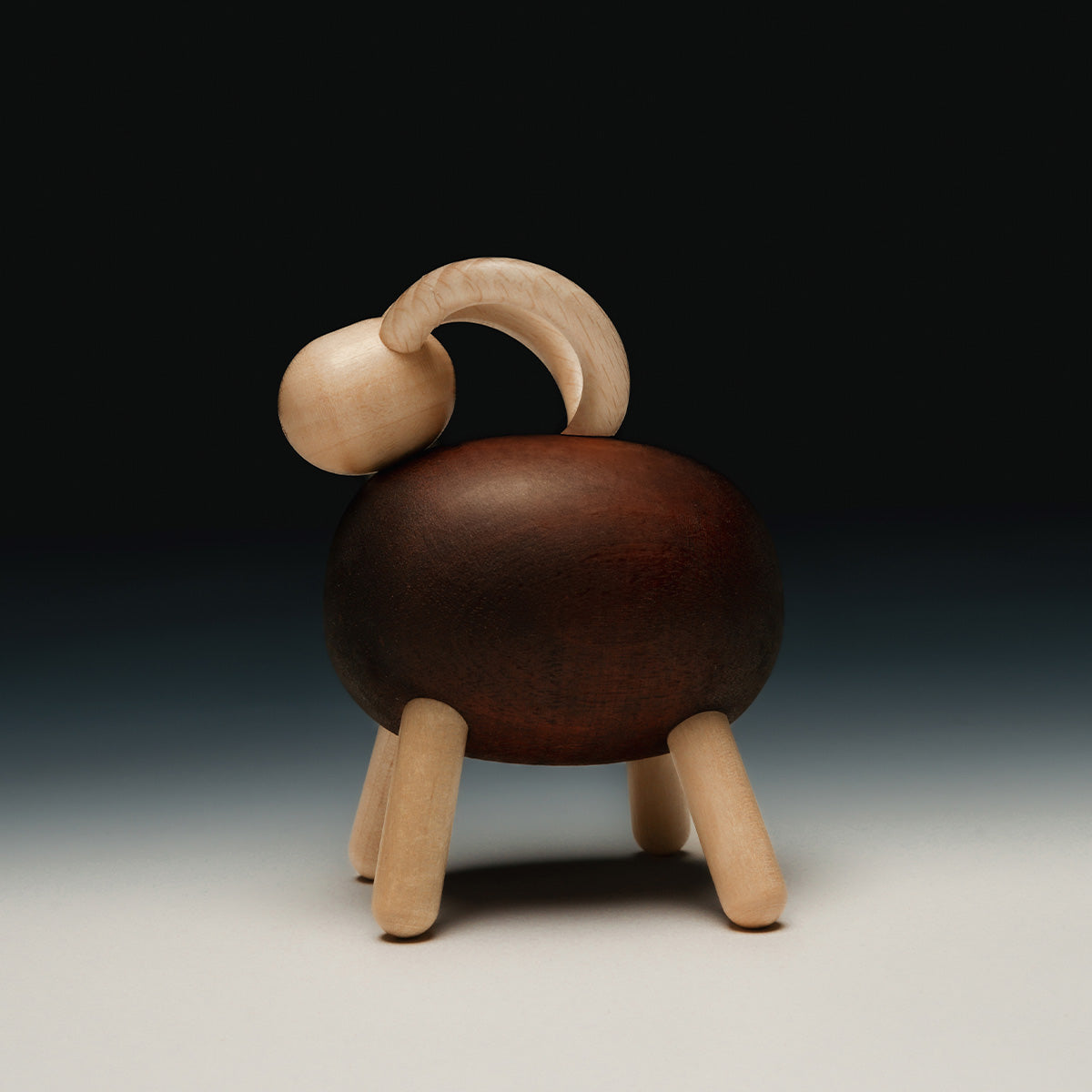 Goat sculpture, 9,5 cm, varnished wood and brown